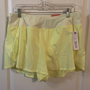 Neon yellow athletic shorts.
